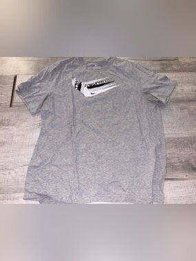 The Nike Tee triple swoosh